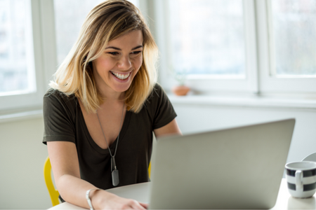 A photo of a woman on the computer