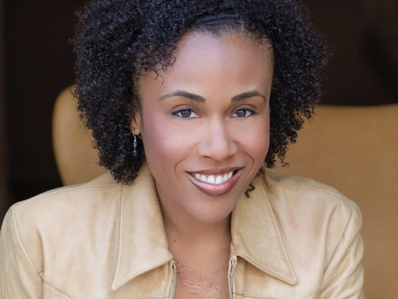 A headshot of Audra.