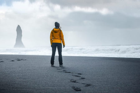 A photo of a woman on the beach